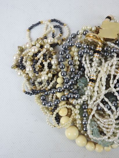 LOT of fancy pearl necklaces. 