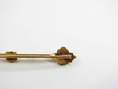 BROCHURE in yellow gold 750 thousandths and...