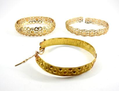 THREE RIGID BRACELETS in gold 750 thousandth....