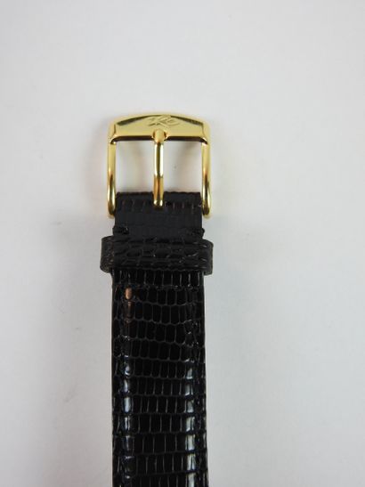 ROLEX: Man's watch, square case in yellow...