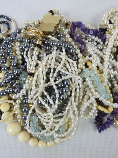 LOT of fancy pearl necklaces. 
