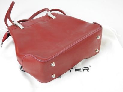 LANCASTER: Backpack color red. With dust-bag....