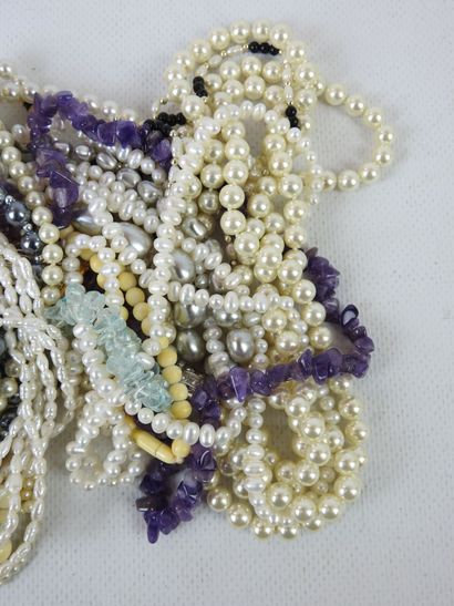 LOT of fancy pearl necklaces. 