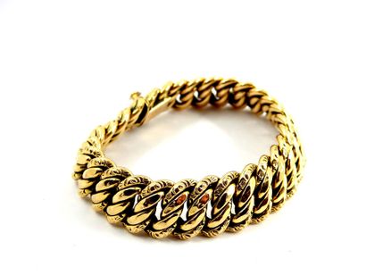 BRACELET Gourmette in yellow gold 750 thousandth....