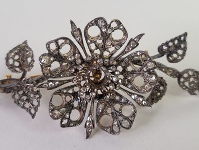 18K (750°/°°) yellow gold and silver (800°/°°)...