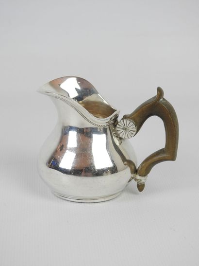 TWO SELFISH JUGS and a creamer in silver...