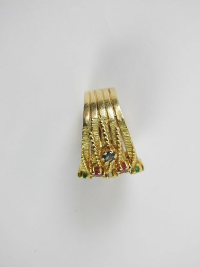 Yellow gold ring made of five rings decorated...