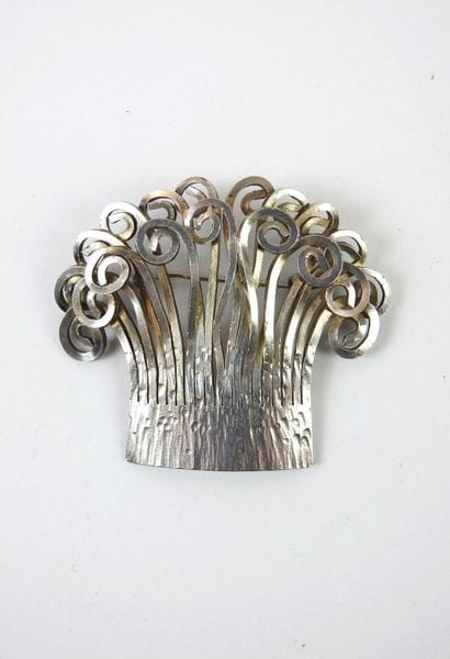 Spout in hammered and carved silver. Foreign...