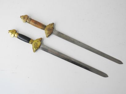CHINA. Set of two daggers with brass mounts,...
