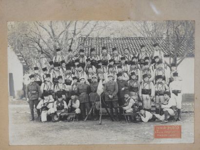 PHOTOGRAPHY. Framed group portrait of a section...