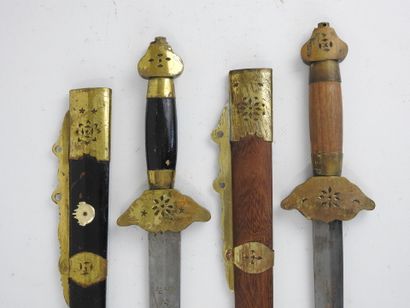 CHINA. Set of two daggers with brass mounts,...
