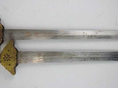 CHINA. Set of two daggers with brass mounts,...