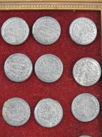 BUTTONS. Suite of 20 flat pewter buttons...