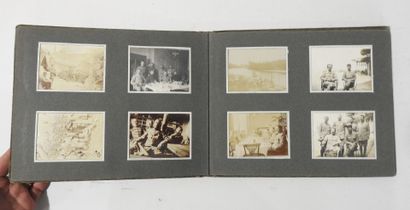 PHOTO ALBUM. Album format 15 X 24 cm containing...