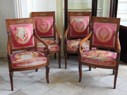 Suite of four mahogany armchairs, the armrests...