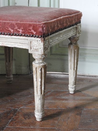 Square shaped stool in molded, carved and...