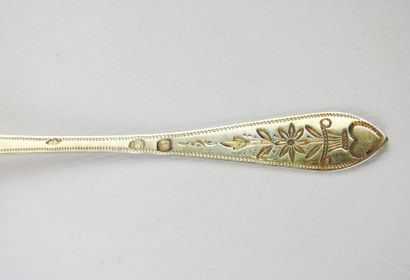 Suite of twelve small silver spoons gilded...