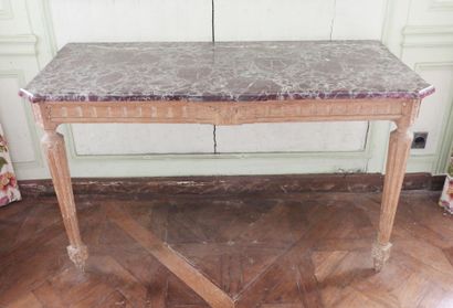 Wall console in carved natural wood resting...