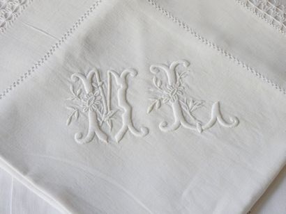 Pair of pillowcases figured M.L. with days...
