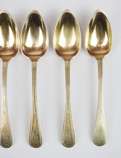 Suite of eight small gilt silver spoons,...