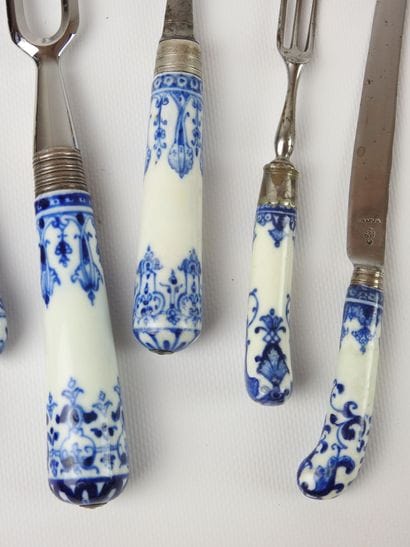 Set in metal and blue white porcelain composed...
