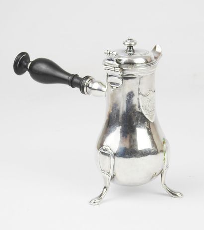Silver tripod selfish jug decorated with...