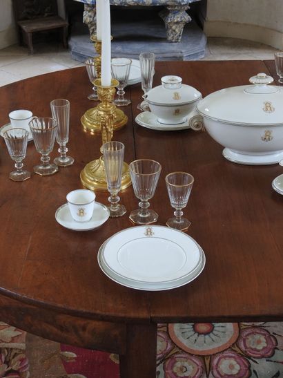 Mahogany dining room table with band, resting...