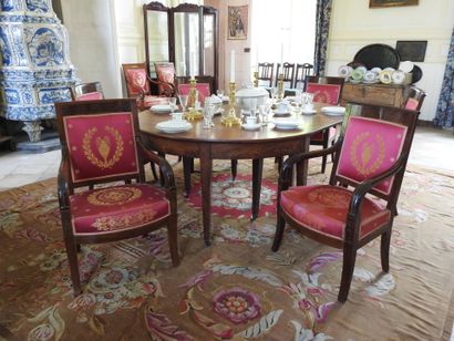 Suite of six mahogany armchairs, the armrests...