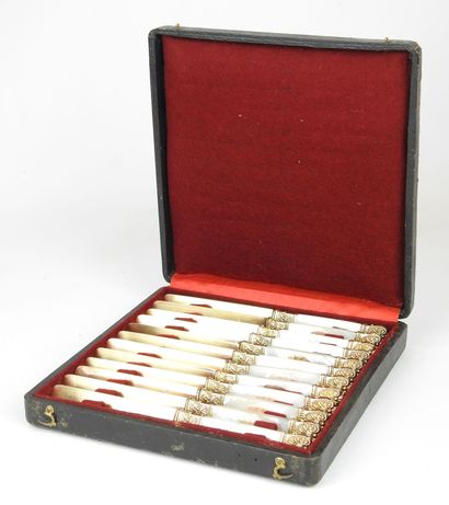 Suite of twelve silver gilt knives with mother-of-pearl...