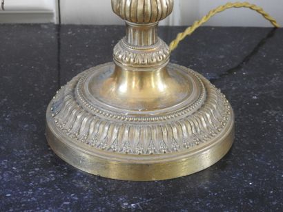 Pair of Louis XVI style candlesticks in chased...