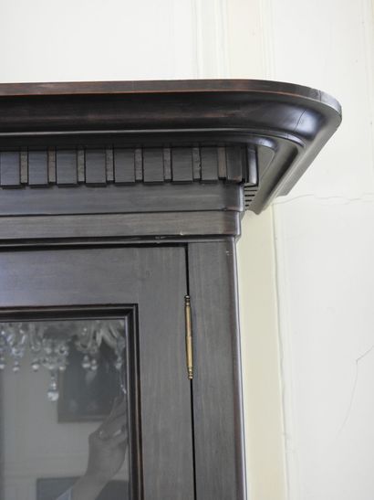 Display case in blackened wood with sides...