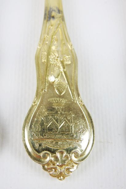 Rare silver gilt dessert set with rich decoration...