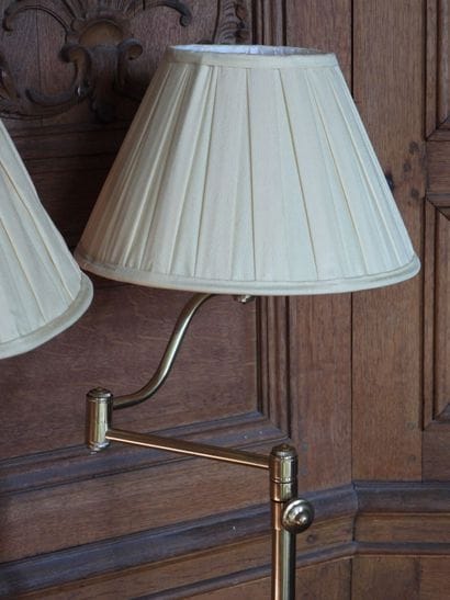 Pair of reading lamps in gilded metal on...