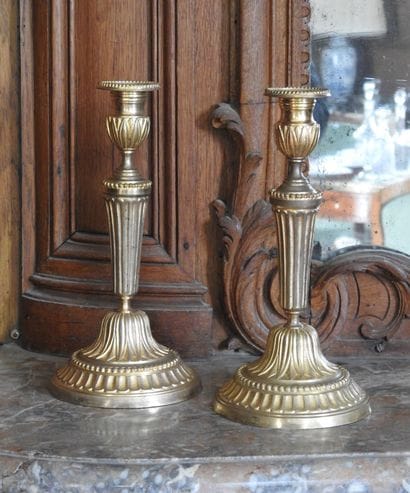 Pair of ormolu torches decorated with hearts...