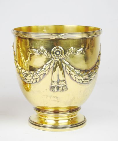 Pair of gilt Minerva silver coolers resting...