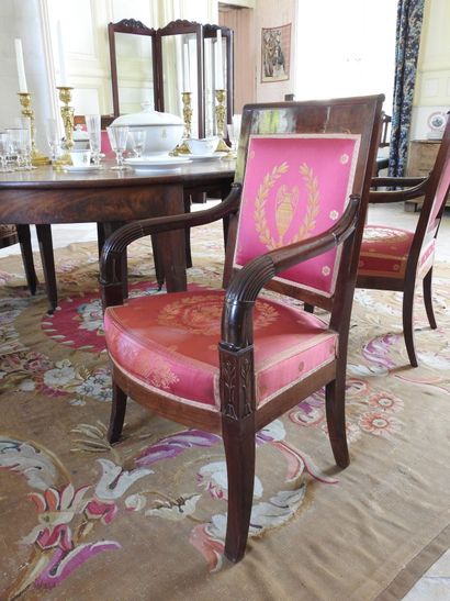 Suite of six mahogany armchairs, the armrests...