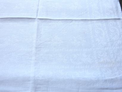 Twelve napkins decorated with flowers and...