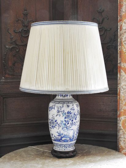 Earthenware lamp with white and blue decoration...
