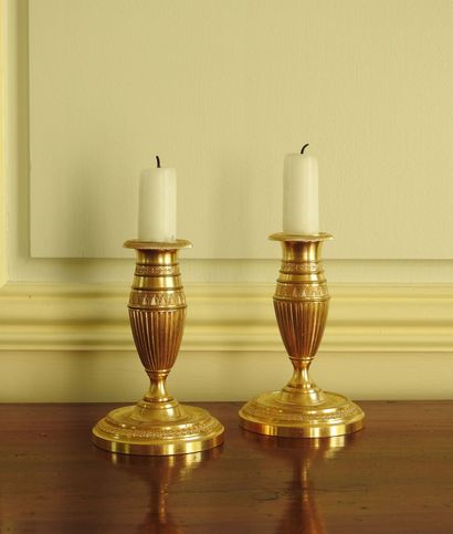 Pair of gilt bronze toilet candlesticks in...