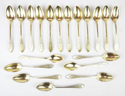 Suite of twelve small silver spoons gilded...