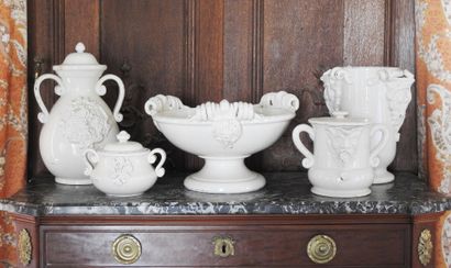 Set of cream colored cracked earthenware...