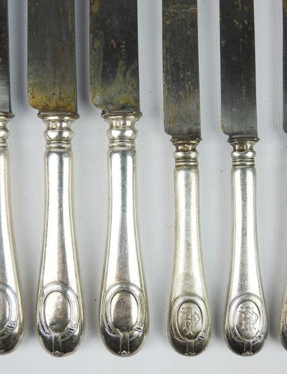 Suite of six large forged silver knives with...