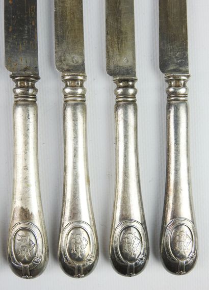 Suite of six large forged silver knives with...