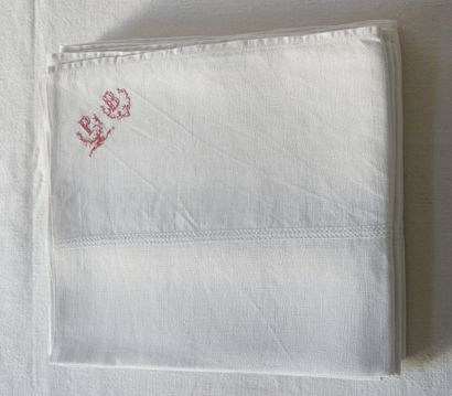 Eleven towels with P.B. in red.
