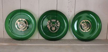 Suite of three green tinted crystal cups...