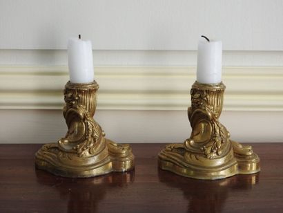 Pair of small bronze candlesticks in Rocaille...