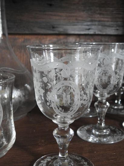 Part of service of crystal glasses monogrammed...