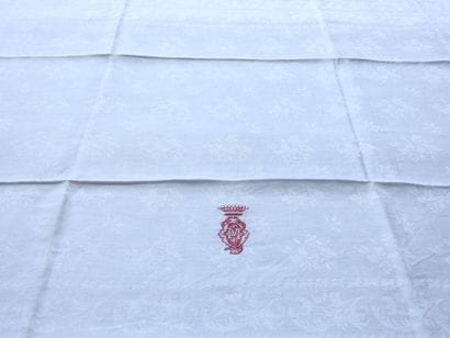 Twelve napkins decorated with flowers and...