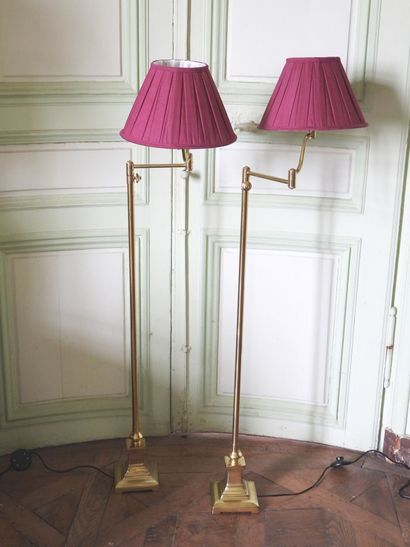 Pair of reading lamps in gilded metal on...