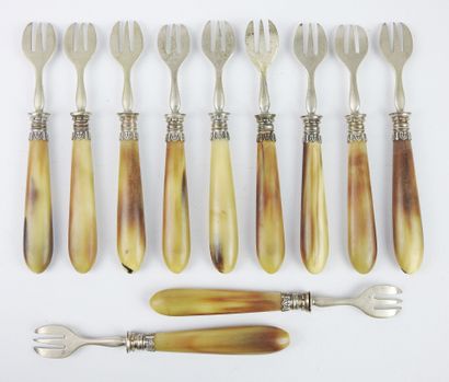 Suite of eleven oyster forks with horn handles...
